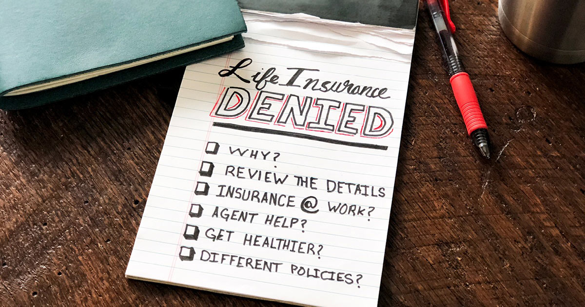A notepad with a list of action items to take after life insurance was denied.