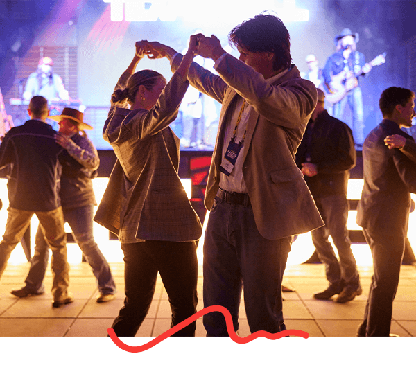 A Couple Dancing at the Event