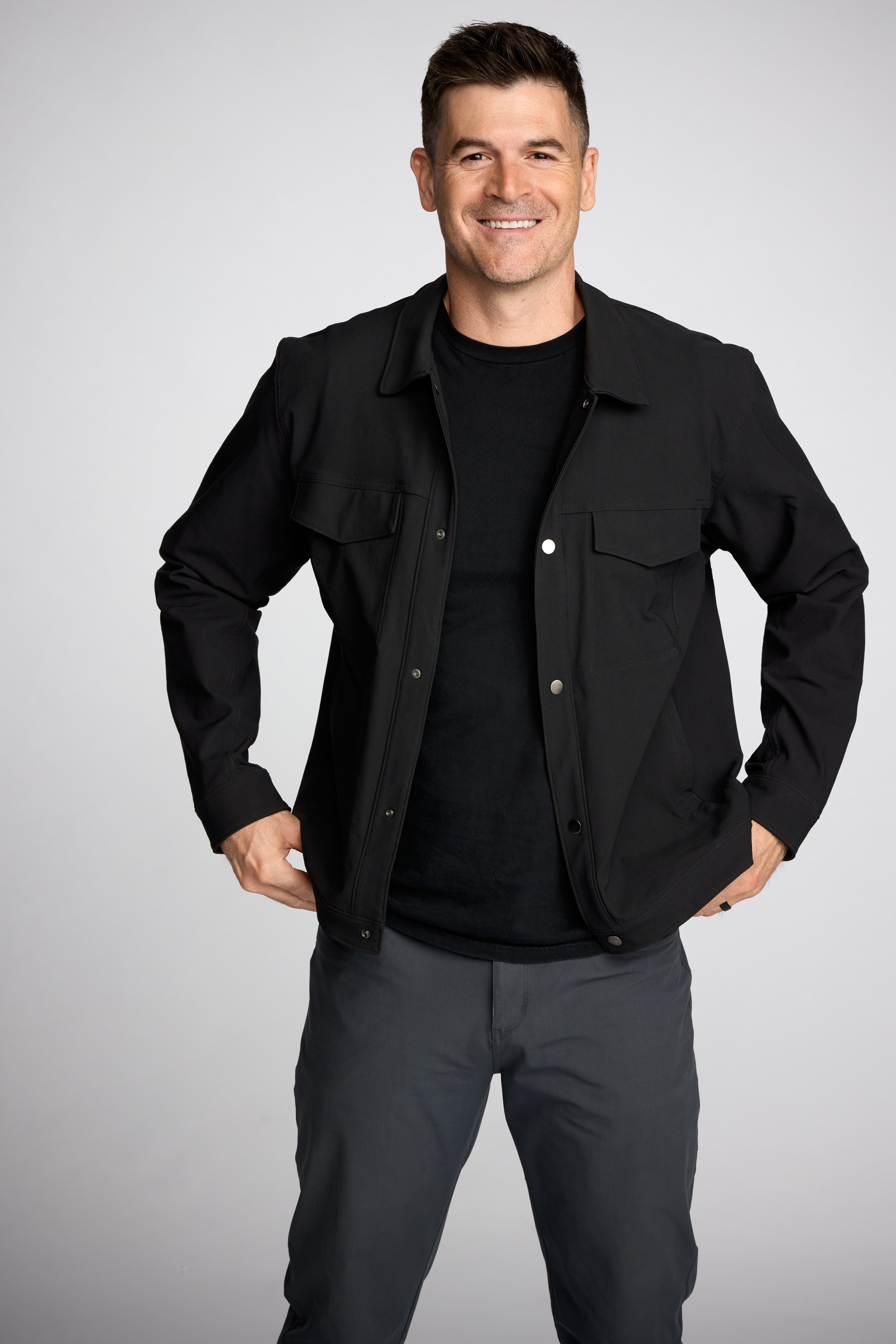 photo of Dr. John Delony in a black jacket