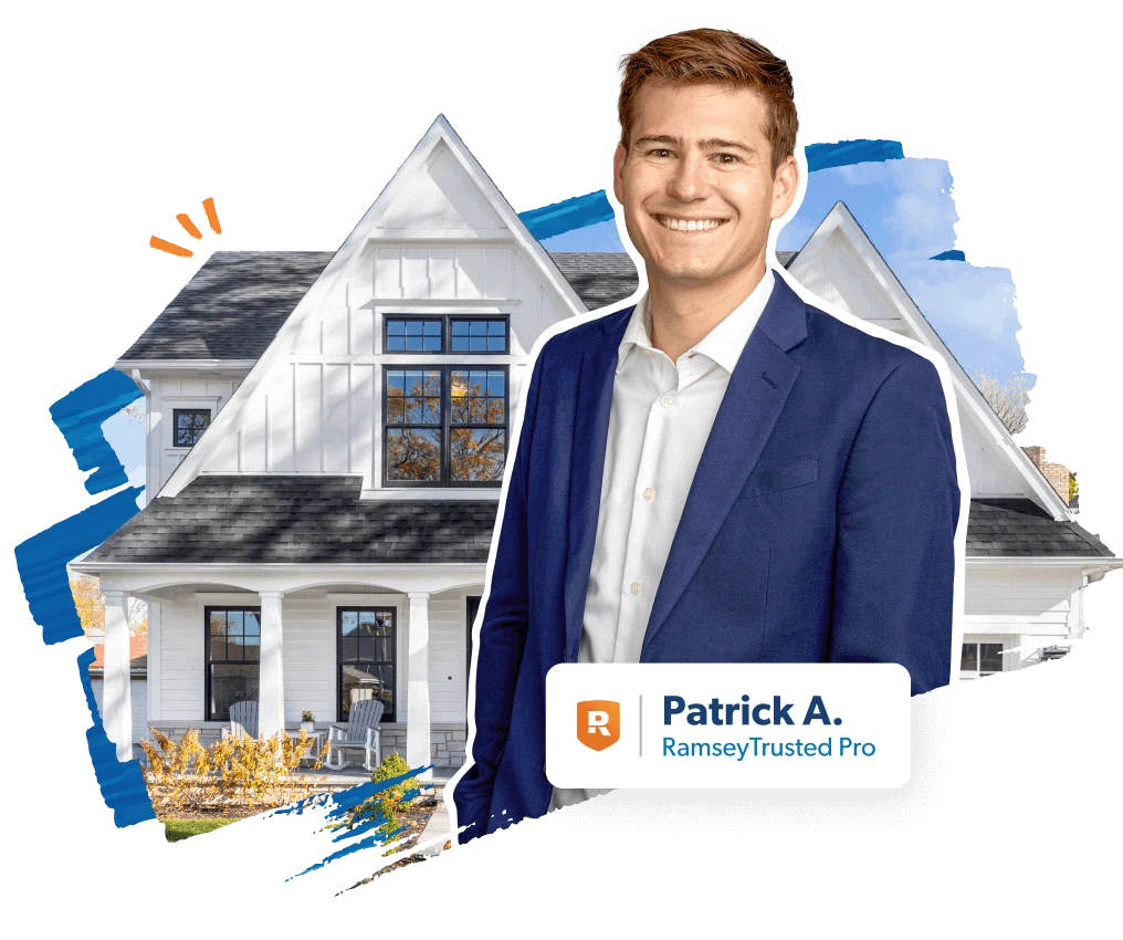 An insurance agent standing in front of a house