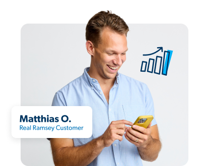 Guy holding a phone looking at term life rates.