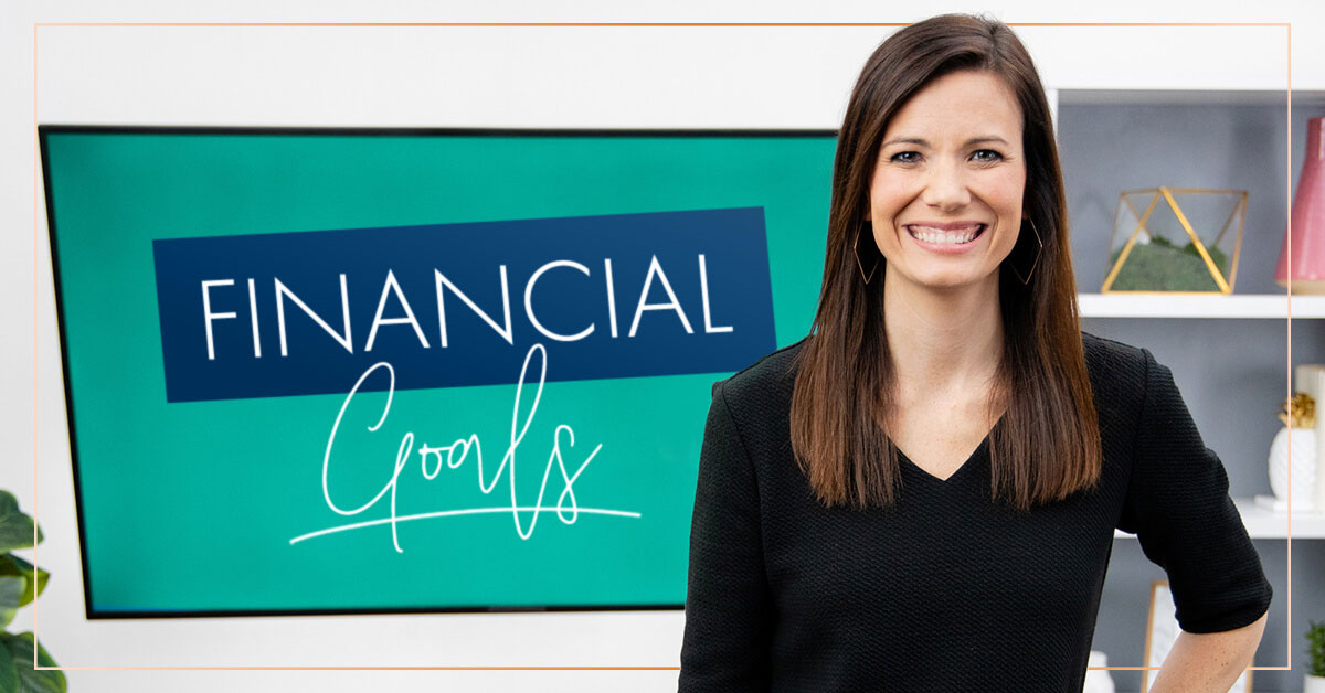 Rachel Cruze standing in front of a screen that says financial goals.