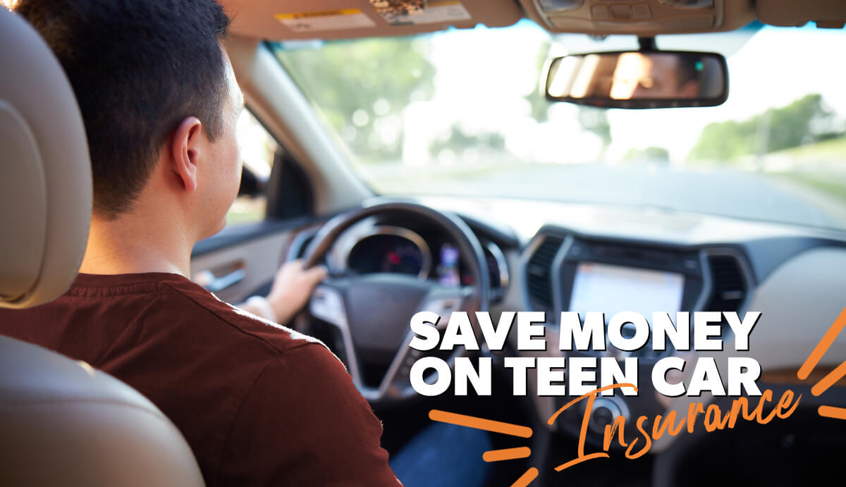 A teen driving a car on an interstate.
