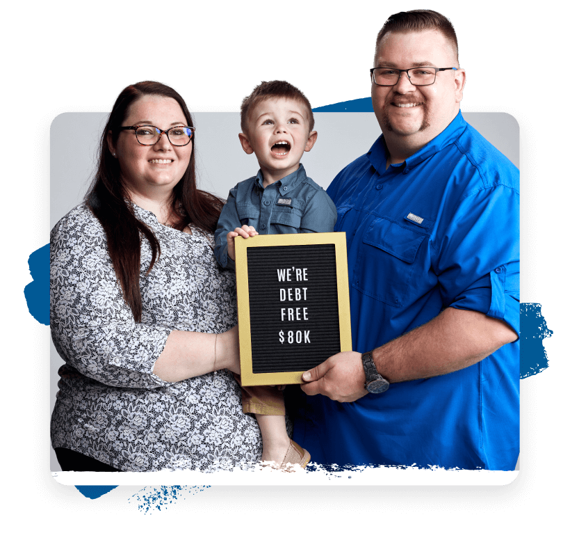 Family holding sign saying we're debt free, 80k