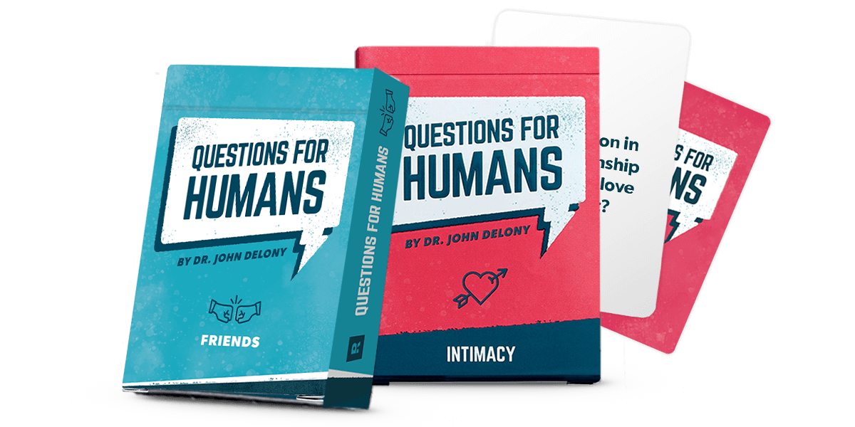 An image of a deck of Questions for Humans Friends and a deck of Questions for Humans Intimacy